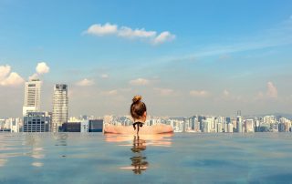 Female Tourist In Infinity Pool Of Marina Bay Singapore
